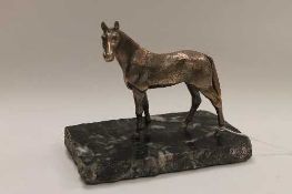 A silver plated figure of a horse, on marble plinth, height 14 cm.   CONDITION REPORT:  Good