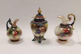 A Hadley's Worcester miniature urn and cover, height 13.5cm, together with two miniature ewer of the