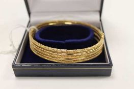 A 9ct gold textured five-band bracelet, 16.1g.   CONDITION REPORT:  Good condition.
