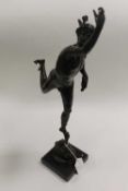 A bronze study of Apollo running, on marble plinth, height 54 cm.   CONDITION REPORT:  Good