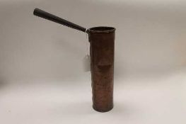 A nineteenth century copper measure, height 25 cm.   CONDITION REPORT:  Time aged good condition.