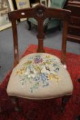 A pair of Victorian mahogany scoop-backed chairs with tapestry upholstery. (2)   CONDITION
