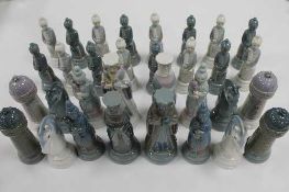 A thirty two piece Lladro chess set. (32)   CONDITION REPORT:  Good condition, one small chip to the