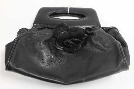 A Chanel black leather hand bag.   CONDITION REPORT:  Good condition.