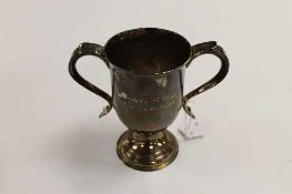 A silver twin-handled cup, London mark, date stamp 1796, height 15 cm, 309 g.    CONDITION