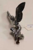 An early twentieth century French car mascot depicting a winged kneeling lady.   CONDITION