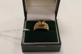 A 9ct gold diamond and quartz ring, 6g.   CONDITION REPORT:  Good condition.