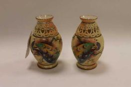 A pair of Locke & Co Worcester miniature blush ivory vases decorated with peacocks, height 11 cm. (
