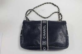 A Chanel blue leather hand bag, with authenticity card no. 9864025.   CONDITION REPORT:  Good