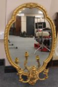 An antique gilt framed girandole mirror, height 98 cm.   CONDITION REPORT:  Good condition, with