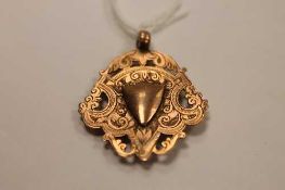 A 9ct gold ornate fob, 7.4g.   CONDITION REPORT:  Good condition.