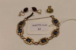An early twentieth century rolled gold bracelet, together with a pair of 9ct gold backed earrings