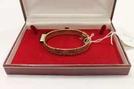 A 9ct three tone gold bracelet, 20.3g.   CONDITION REPORT:  Good condition.