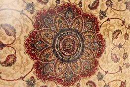 A Kashmir fringed rug with medallion centre on cream ground, 135 cm  x 200 cm.