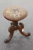 An early Victorian rosewood revolving embroidered adjustable stool.   CONDITION REPORT:  Good
