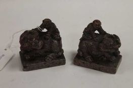 A pair of Chinese soapstone carved figures, signed. (2)   CONDITION REPORT:  Good condition, thought
