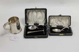 A silver miniature tankard, height 8cm, together with a silver spoon and a spoon with pusher, both