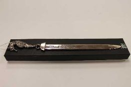 A silver letter opener, surmounted by a seahorse, Sheffield 1979, 61.8g.   CONDITION REPORT:  Good