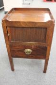 A Victorian mahogany shutter fronted bedside cabinet, fitted with a drawer, width 48 cm.   CONDITION