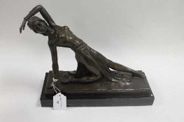 After D H Chiparus - Bronze figure of a reclining lady, on marble plinth, height 26 cm.