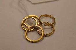Five 22ct gold band rings, 15g.   CONDITION REPORT:  Good condition, each with patination to the