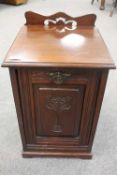 An Edwardian mahogany coal receiver with liner, width 36 cm.   CONDITION REPORT:  Good time aged