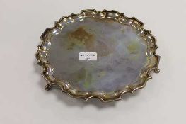 A silver scalloped-edged tray, London mark, date stamp 1923, 700g.    CONDITION REPORT:  Good