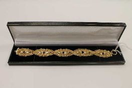 A 9ct gold ribbon bracelet, 11.1g.   CONDITION REPORT:  Good condition.