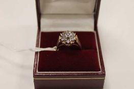 A 9ct gold diamond cluster ring.   CONDITION REPORT:  Illusion set small diamond chip clusters.