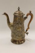 An early nineteenth century silver coffee pot, London marks, 28 oz.   CONDITION REPORT:  Good