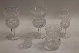 Fifteen Edinburgh crystal thistle glasses, together with eleven other glasses of the same design. (