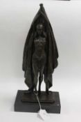 After D H Chiparus - Bronze study of a dancer with arms raised, on black marble plinth, height 47