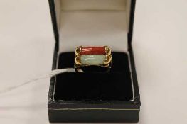 A 14ct gold two tone jade ring.   CONDITION REPORT:  Good condition.
