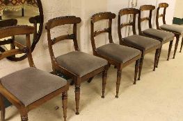 A set of six Victorian mahogany dining chairs with turned front legs. (6)   CONDITION REPORT: