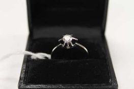 An 18ct white gold diamond solitaire ring, approximately 0.40ct, colour D/E, clarity VS.   CONDITION