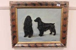 Henry Luker : 'Two black spaniels', oil on canvas, signed, 40 cm x 50 cm, framed.
