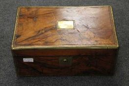 A nineteenth century brass bound walnut writing box, width 40 cm.    CONDITION REPORT:  Internal lid