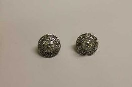 A pair of diamond cluster earrings, approximately 3.7ct. (2) CONDITION REPORT: Good condition, large