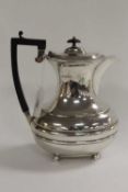 A silver hot water jug, Sheffield 1918, 24 oz. CONDITION REPORT: Good condition.
