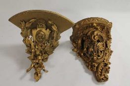 Two gilt-wooden wall brackets. (2) CONDITION REPORT: Some minor losses, one appears to be nineteenth