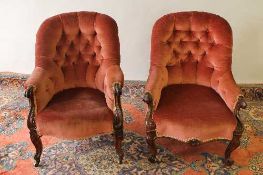 A near pair of Victorian walnut buttoned backed armchairs. (2) CONDITION REPORT: Good condition,