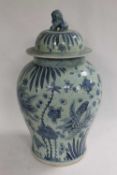 A pair of Chinese blue and white lidded temple urns, height 64 cm. (2) CONDITION REPORT: Good