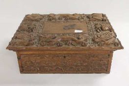 A Chinese carved hardwood table box, width 50 cm. CONDITION REPORT: One minor loss of wood to