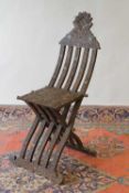 Moorish style occasional chair. CONDITION REPORT: Fair condition, missing inlays in areas but