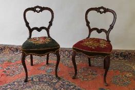 A pair of Victorian walnut salon chairs. (2) CONDITION REPORT: Good condition with tapestry seats.
