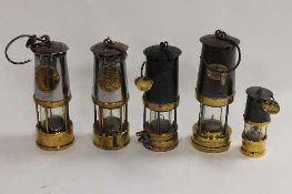 A Patterson miner's lamp numbered 1076, together with four other miner's lamps. (5) CONDITION