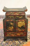 An early twentieth century oriental lacquered storage cabinet, width 46 cm. CONDITION REPORT: Good