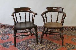 Two early twentieth century half-smoker chairs. (2) CONDITION REPORT: Fair condition, time aged.