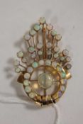 A 9ct gold Art Deco opal brooch. CONDITION REPORT: Good condition.