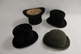 A Lock & Co Gentleman's silk top hat, boxed, together with two other top hats and a Dunn & Co bowler